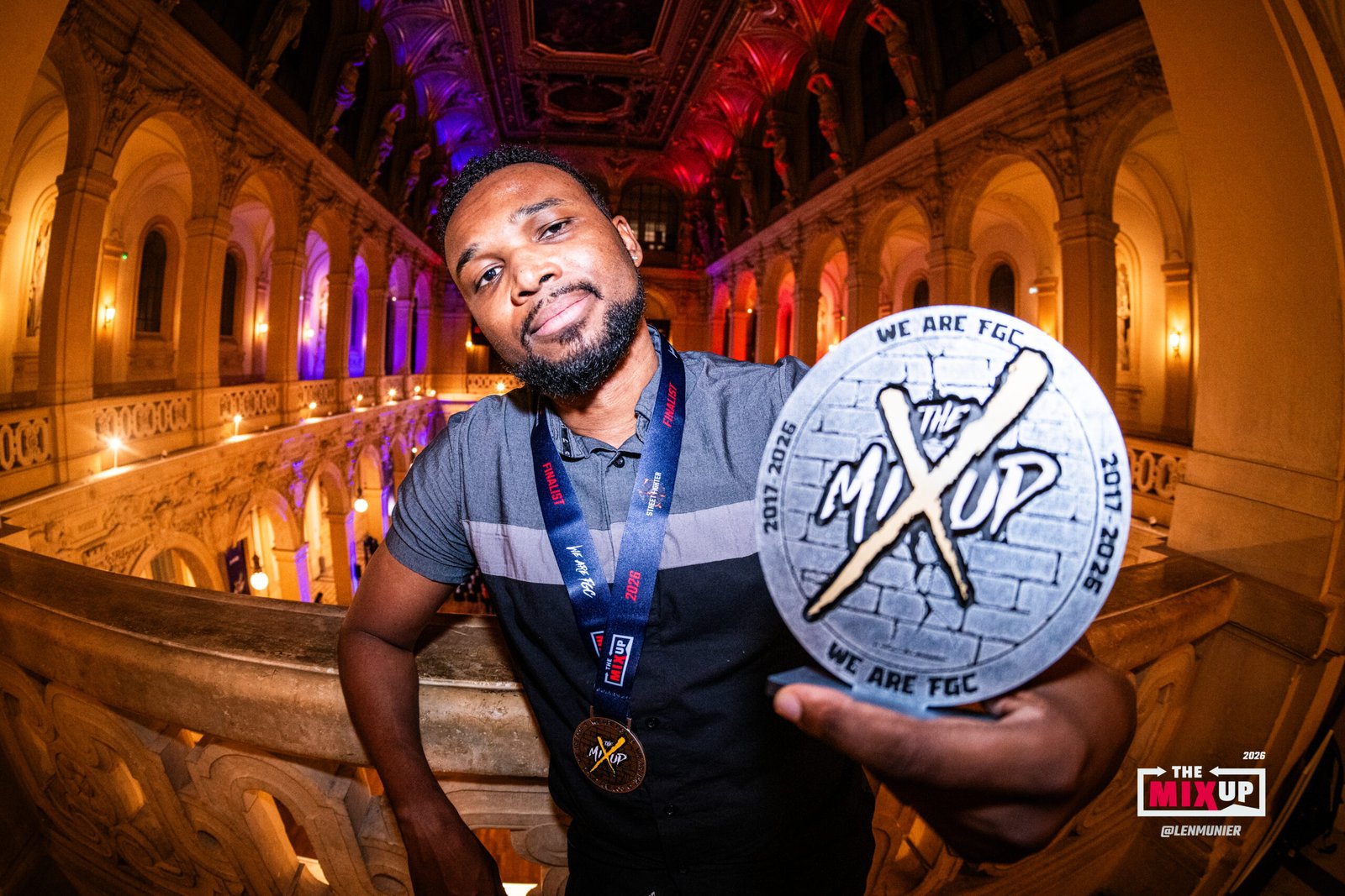Nathan "Mister Crimson" Massol, champion du MIXUP 2026 sur Street Fighter 6. Photo : @Lenmunier